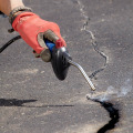 Sealing Cracks in Pavement: Tips for Plumbing, Electric, and Home Maintenance